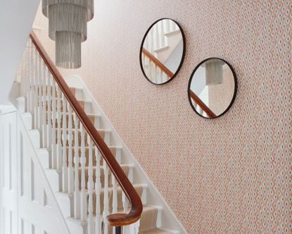 A Mirrored Staircase Wall