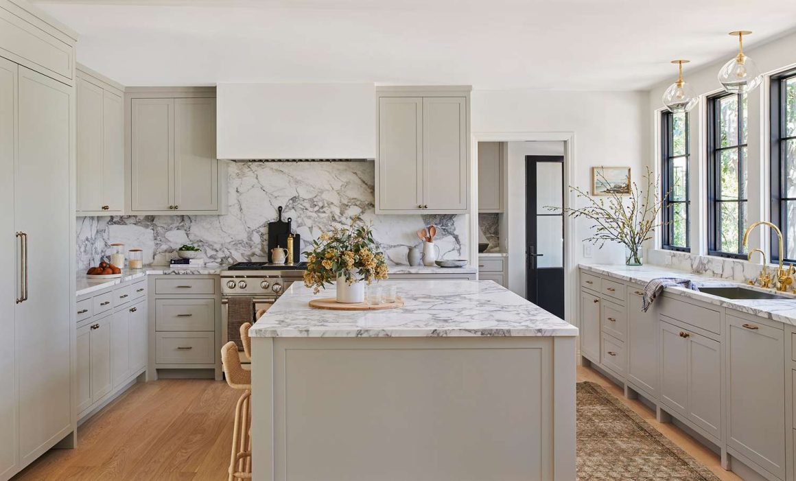 Light Wood Wall Set with White Marble Countertop Kitchen.